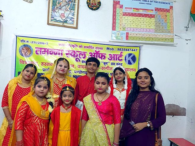 Group of women in colourful traditional dress standing together