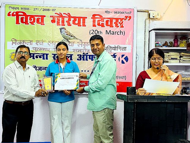Children with guests holding certificates at an event