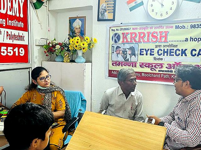 Medical team screening visitors at a health camp